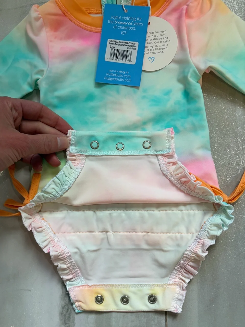 NWT RuffleButts Rainbow Tie Dye Long Sleeve Rash Guard One Piece Swimsuit, 0-3M